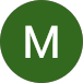 A white letter “M” is centered on a solid green circular background.